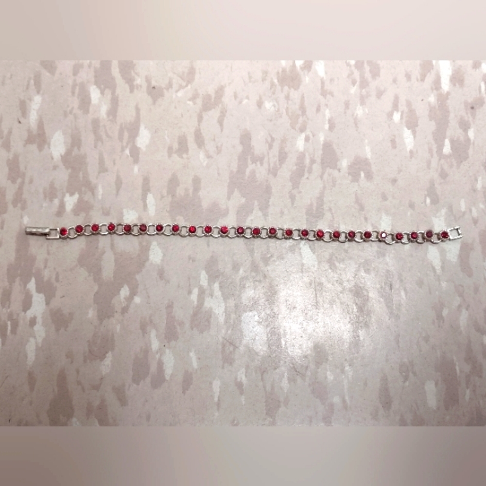 Avon Ruby Silver Tone Bracelet